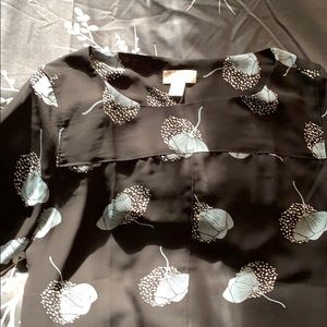 Black with light blue and white flower design top